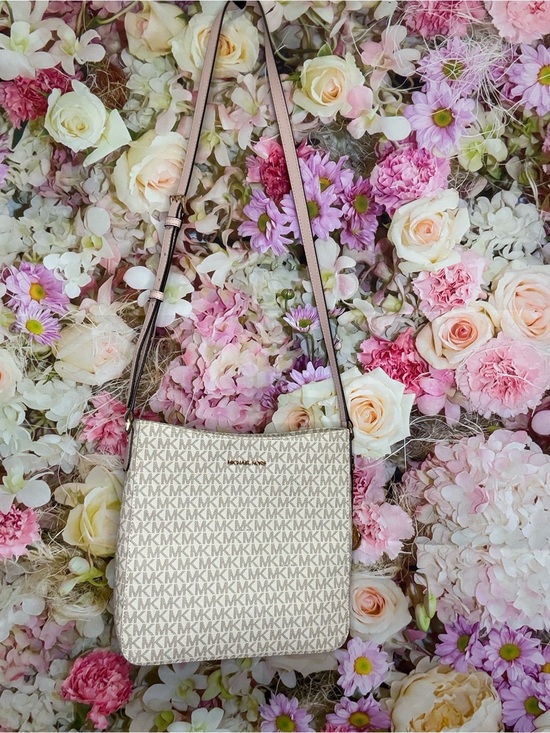 Michael Kors Handbags - Michael Kors Cream Logo Crossbody Bag with Pale Pink Strap Trim